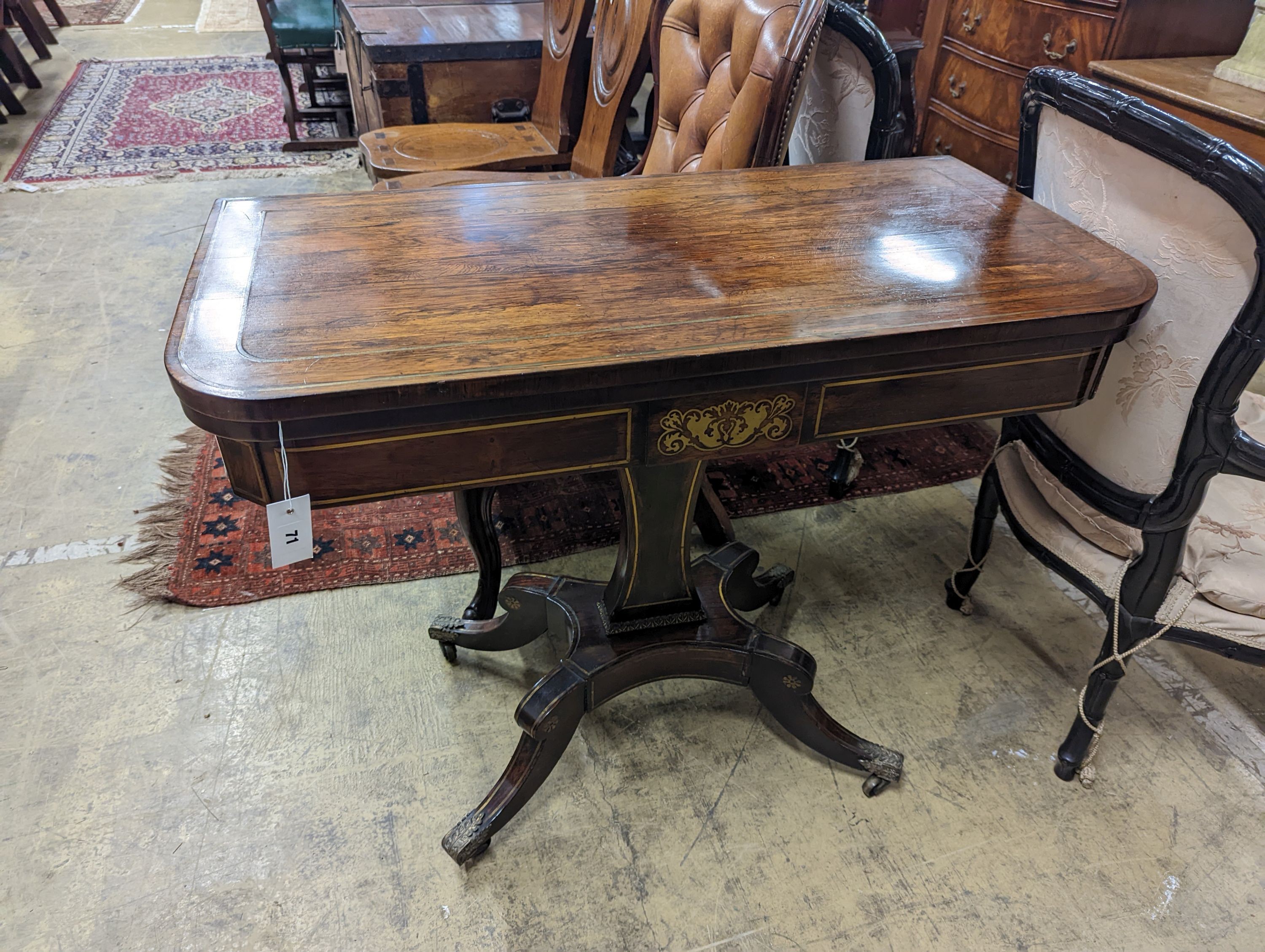A Regency brass inlaid rosewood rectangular folding card table, width 91cm, depth 46cm, height 76cm